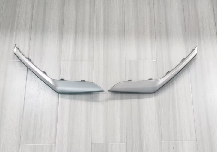 Front bumper decorative strip silver gray left
