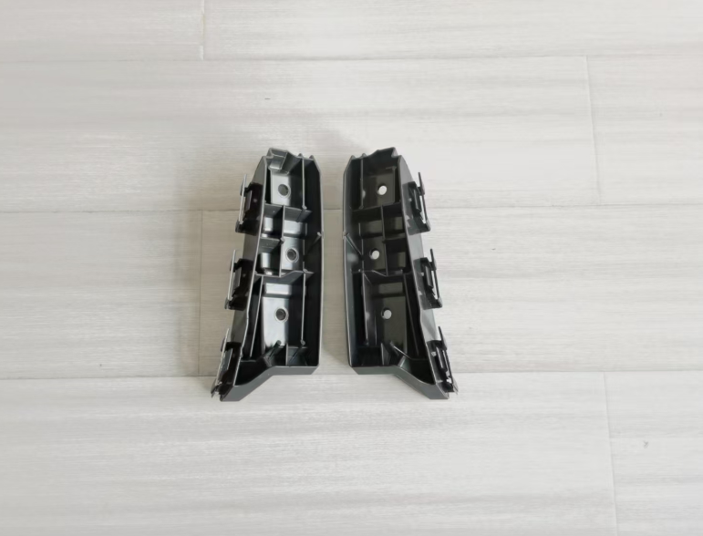 Left mounting plate for front headlight